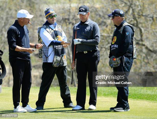 Rocco Mediate and partner Lee Janzen look on during the first round of the PGA TOUR Champions Bass Pro Shops Legends of Golf held at Buffalo Ridge...