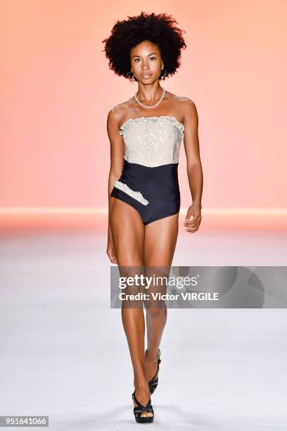 Model walks the runway at the Amir Slama Fall Winter 2018 fashion show during the SPFW N45 on April 24, 2018 in Sao Paulo, Brazil.