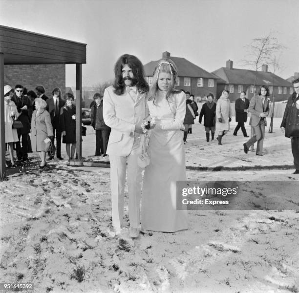 English singer-songwriter and multi-instrumentalist Roy Wood with his bride, Maureen Holmes, UK, 13th January 1970.