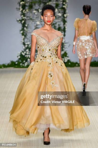 Model walks the runway at the Samuel Cirnansck Fall Winter 2018 fashion show during the SPFW N45 on April 23, 2018 in Sao Paulo, Brazil.