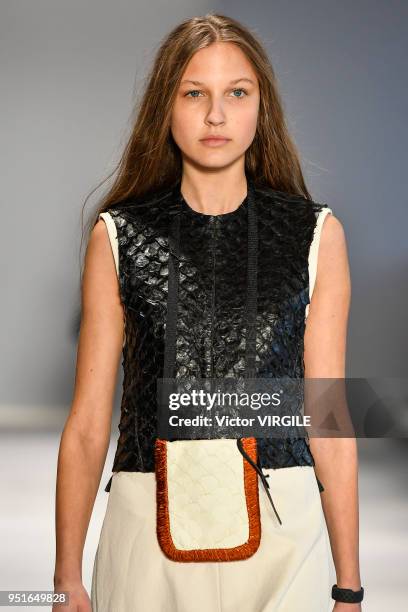 Model walks the runway at the Osklen Fall Winter 2018 fashion show during the SPFW N45 on April 23, 2018 in Sao Paulo, Brazil.