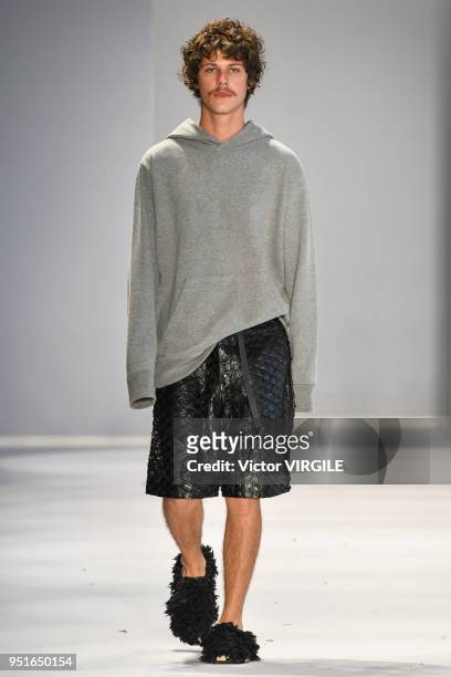 Model walks the runway at the Osklen Fall Winter 2018 fashion show during the SPFW N45 on April 23, 2018 in Sao Paulo, Brazil.