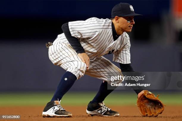 Ronald Torreyes of the New York Yankees looks on against the Toronto Blue Jays during the fifth inning at Yankee Stadium on April 19, 2018 in the...