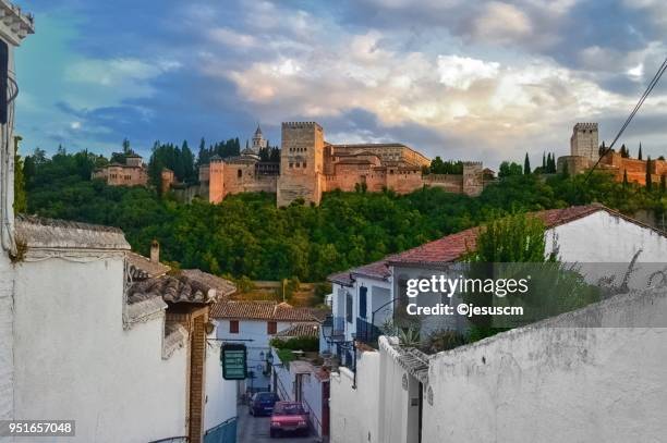 the alhambra, seen from the albaicín - albaicín stock pictures, royalty-free photos & images