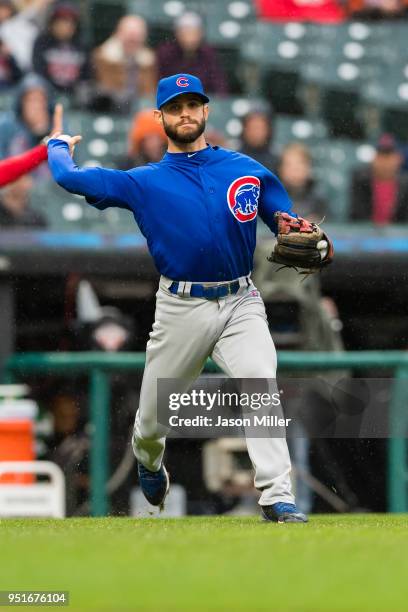 Third baseman Tommy La Stella of the Chicago Cubs throws out Francisco Lindor of the Cleveland Indians on a sacrifice bunt third inning at...