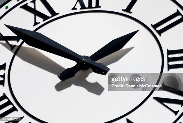 close up of big clock from low angle, ottawa, ontario, canada - dennis mccoleman imagens e fotografias de stock