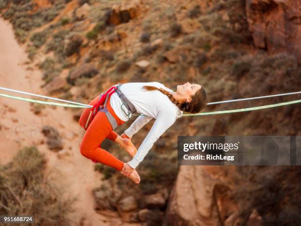 highlining in moab, utah - highlining stock pictures, royalty-free photos & images