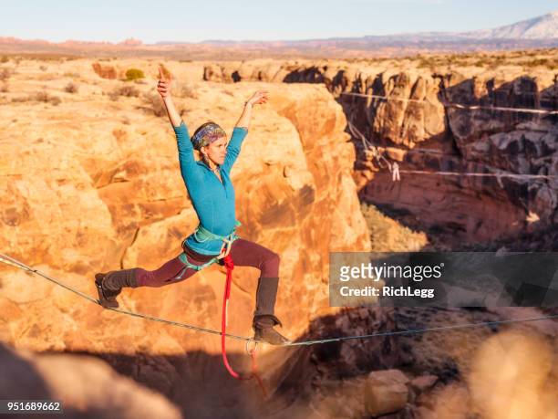 highlining in moab, utah - highlining stock pictures, royalty-free photos & images