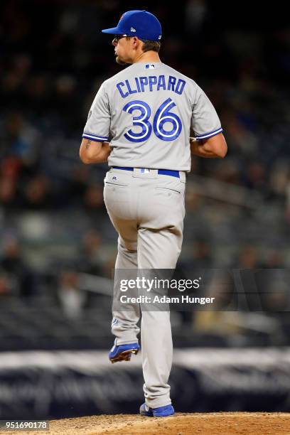 Tyler Clippard of the Toronto Blue Jays pitches against the New York Yankees during the eighth inning at Yankee Stadium on April 19, 2018 in the...