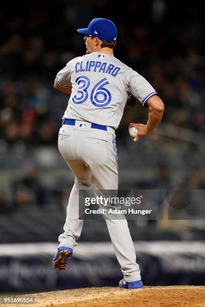 Tyler Clippard of the Toronto Blue Jays pitches against the New York Yankees during the eighth inning at Yankee Stadium on April 19, 2018 in the...