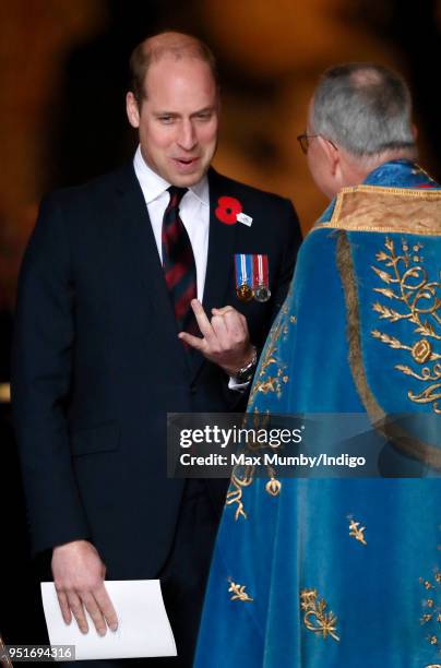 Prince William, Duke of Cambridge talks with the Dean of Westminster, The Very Reverend Dr John Hall as he attends an Anzac Day Service of...