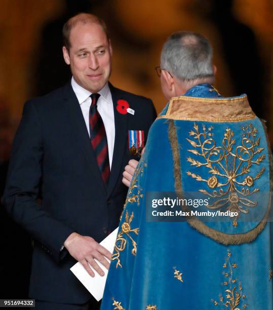 Prince William, Duke of Cambridge talks with the Dean of Westminster, The Very Reverend Dr John Hall as he attends an Anzac Day Service of...