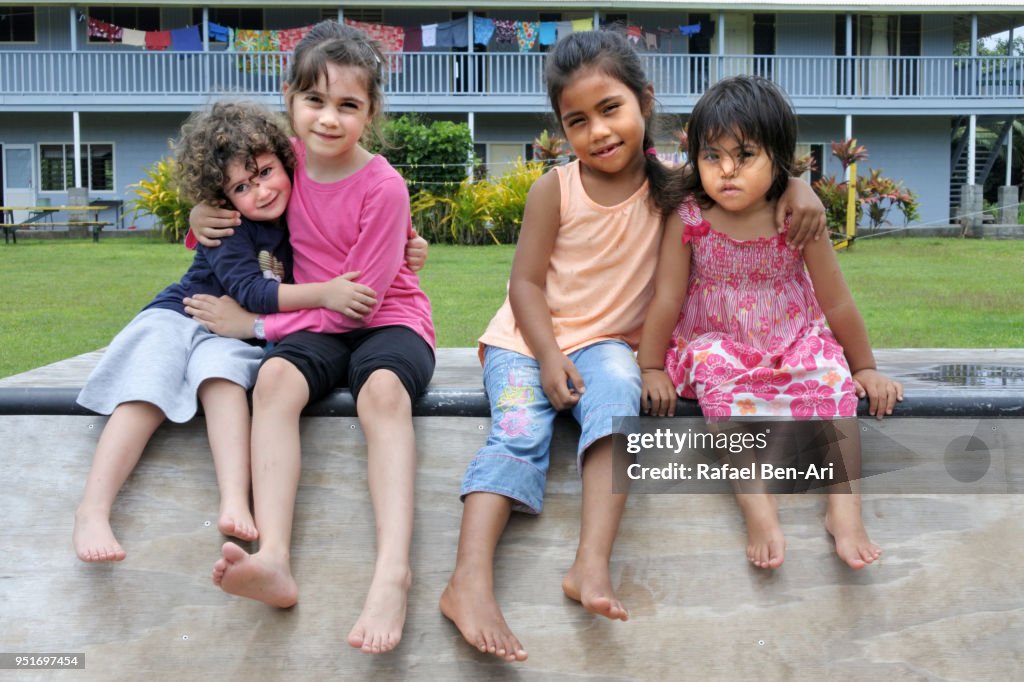 Pacific Islander girls plays with New Zealand Girls in Rarotonga Cook Islands