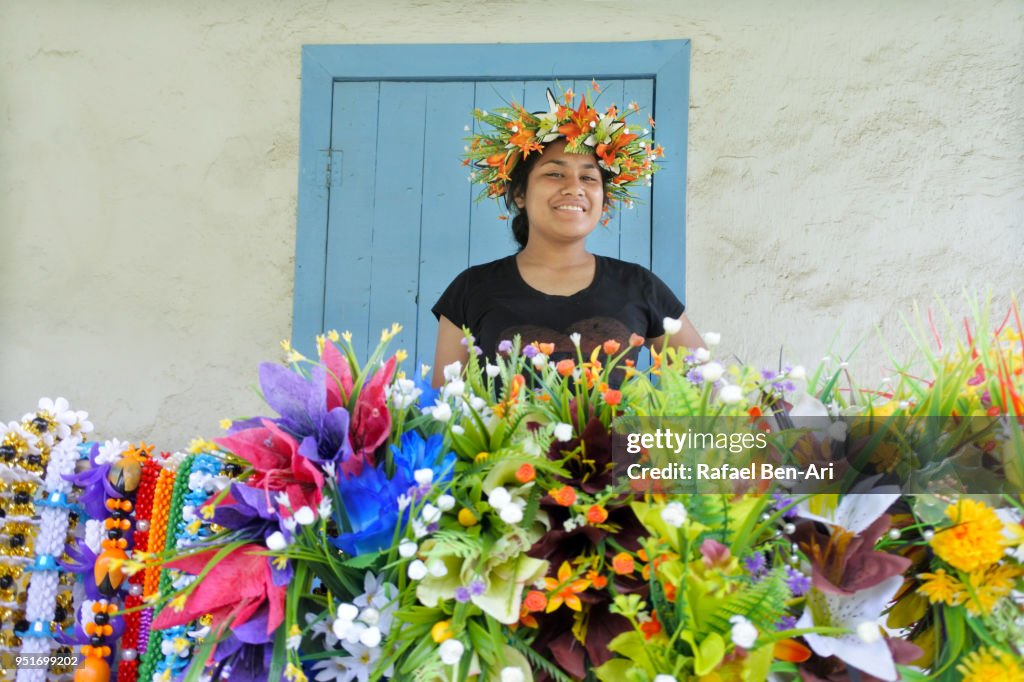 Pacific Islander woman wearing a wreath