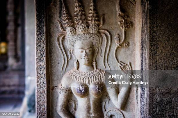 angor wat temple carvings cambodia - harvest cathedral stockfoto's en -beelden