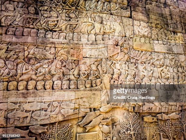 angor wat temple carvings cambodia - harvest cathedral stockfoto's en -beelden