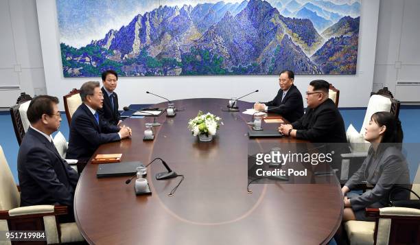 South Korean delegation including President Moon Jae-in and North Korean delegation including Leader Kim Jong Un sit down for the Inter-Korean Summit...