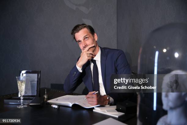 Max von Thun writes with a filler during the 27th Montblanc de la Culture Arts Patronage Award at Residenz on April 26, 2018 in Munich, Germany.