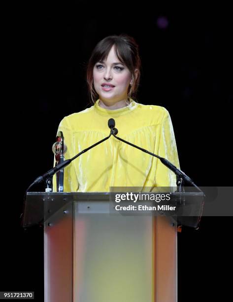 Actress Dakota Johnson accepts the Female Star of the Year award onstage during the CinemaCon Big Screen Achievement Awards brought to you by the...