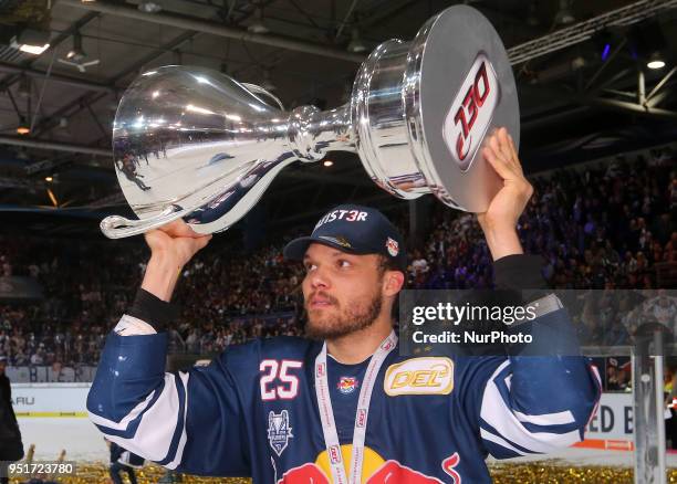 Derek Joslin of Red Bull Munich after winning the DEL Playoff final match seven between EHC Red Bull Munich and Eisbaeren Berlin on April 26, 2018 in...