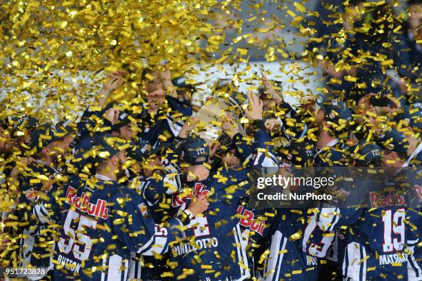 Players of Red Bull Muenchen rising the trophy after the DEL Playoff final match seven between EHC Red Bull Munich and Eisbaeren Berlin on April 26,...