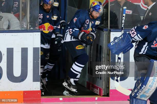 Players of Red Bull Muenchen rising the trophy after the DEL Playoff final match seven between EHC Red Bull Munich and Eisbaeren Berlin on April 26,...