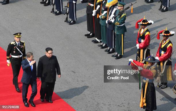 South Korean President Moon Jae-in and North Korean leader Kim Jong Un attend the official welcome ceremony ahead of the Inter-Korean Summit on April...