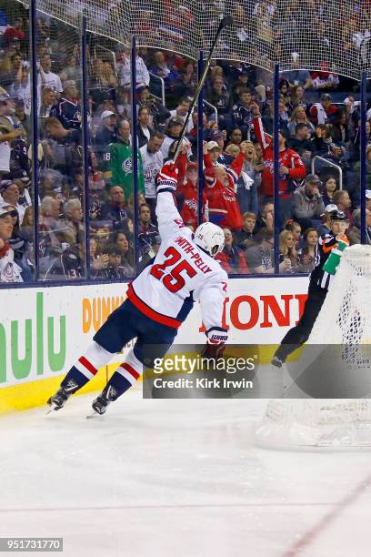 Devante Smith-Pelly of the Washington Capitals celebrates after scoring a goal in Game Six of the Eastern Conference First Round during the 2018 NHL...