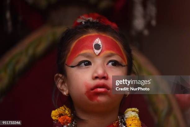 Yrs old Living goddess of Patan, Nihira Bajracharya, arrive to observe the Chariot Pulling Festival of Rato Machindranath 'God of Rain' from...