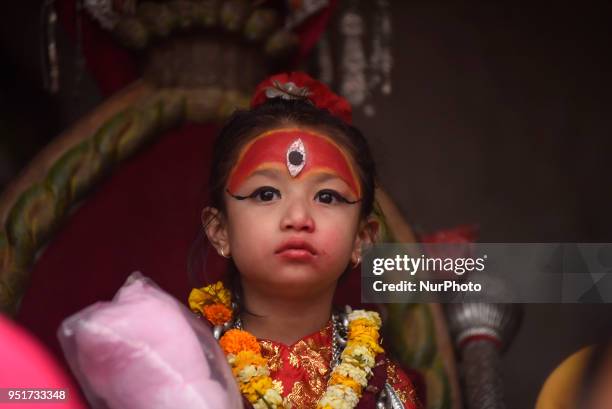 Yrs old Living goddess of Patan, Nihira Bajracharya, arrive to observe the Chariot Pulling Festival of Rato Machindranath 'God of Rain' from...