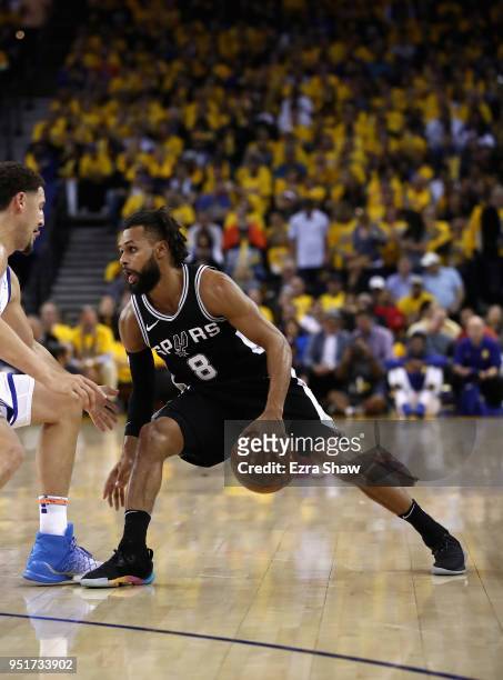 Patty Mills of the San Antonio Spurs in action against the Golden State Warriors during Game Five of Round One of the 2018 NBA Playoffs at ORACLE...