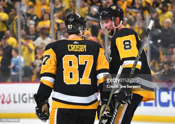 Sidney Crosby talks with Brian Dumoulin of the Pittsburgh Penguins against the Philadelphia Flyers in Game Five of the Eastern Conference First Round...