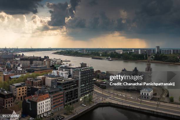 aerial of antwerp city along scheldt river - scheldt river stock pictures, royalty-free photos & images