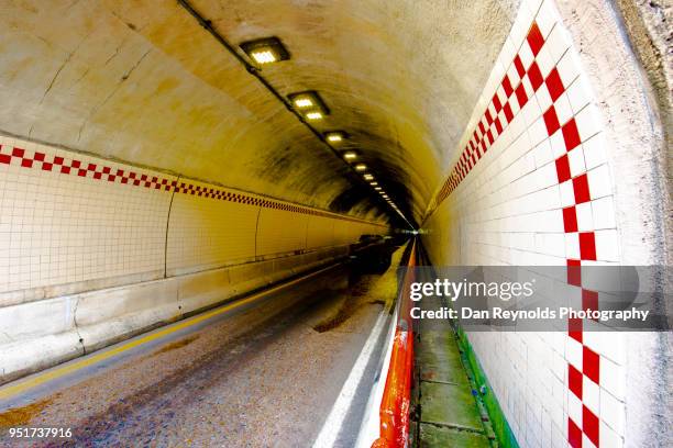 tunnel illuminated - car crash wall stock pictures, royalty-free photos & images