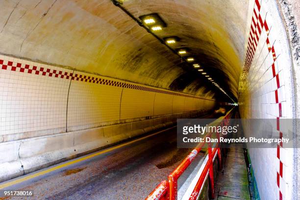 tunnel illuminated - car crash wall stock pictures, royalty-free photos & images