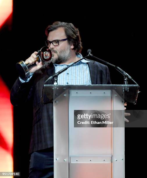 Actor Jack Black accepts the CinemaCon Visionary Award onstage during the CinemaCon Big Screen Achievement Awards brought to you by the Coca-Cola...