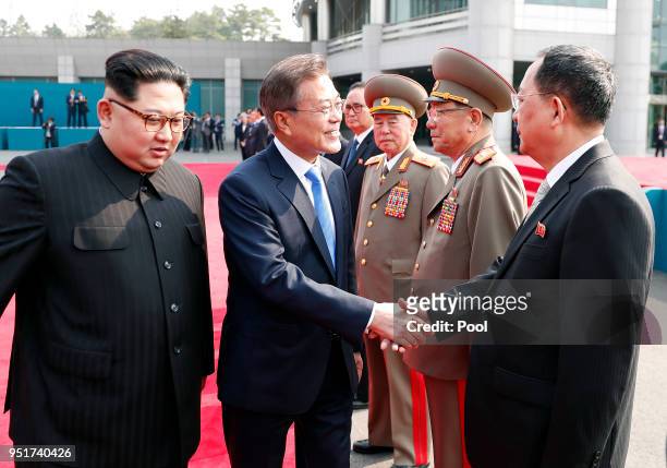 South Korean President Moon Jae-in greets Lee Yong-ho, Foreign Minister of North Korea ahead of the Inter-Korean Summit on April 27, 2018 in...