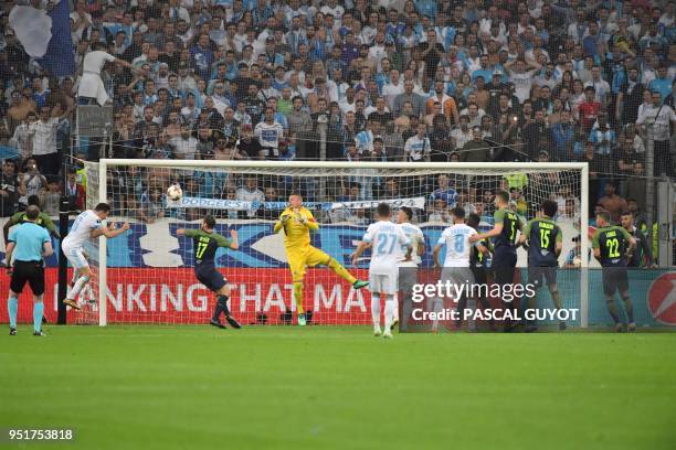 Marseille's Florian Thauvin scores a goal during the UEFA Europa League first-leg semi-final football match between Olympique de Marseille and FC...