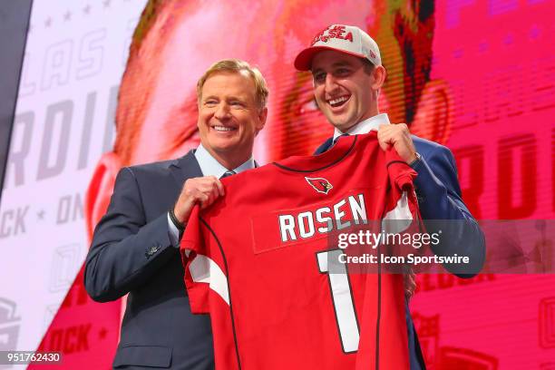 Josh Rosen poses for photos with NFL Commissioner Roger Goodell after being chosen by the Arizona Cardinals with the tenth overall pick during the...