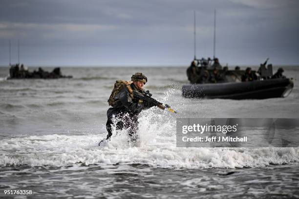 Royal Marines come ashore as they take part in Exercise Joint Warrior on April 26, 2018 in Dundrennan,Scotland. The exercise is involving some 11,600...