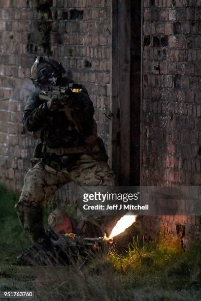 Royal Marines take part in raid during Exercise Joint Warrior on April 27, 2018 in Dalbeattie,Scotland. The exercise is involving some 11,600...