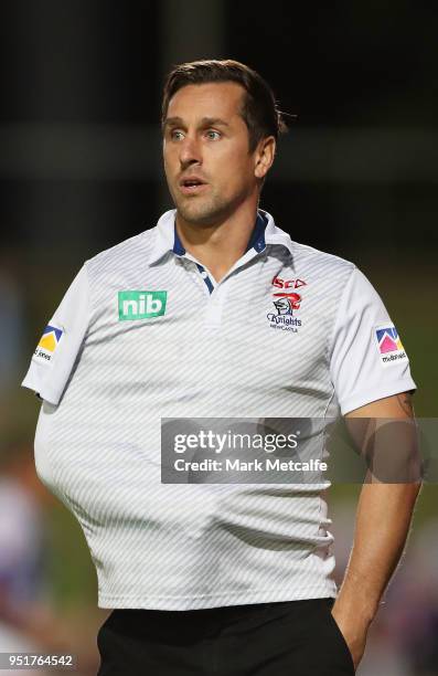 Mitchell Pearce of the Knights watches warm up before the Round eight NRL match between the Manly-Warringah Sea Eagles and the Newcastle Knights at...