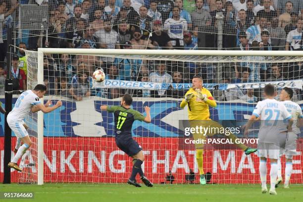 Marseille's Florian Thauvin scores a goal during the UEFA Europa League first-leg semi-final football match between Olympique de Marseille and FC...