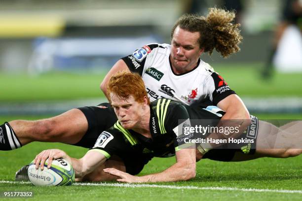 Finlay Christie of the Hurricanes scores a try on debut during the round 11 Super Rugby match between the Hurricanes and Sunwolves at Westpac Stadium...