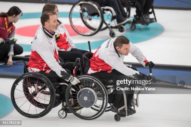 Mark IDESON of Canada deliver a stone in the Wheelchair Curling match between Slovakia and Canada during day 5 of the PyeongChang 2018 Paralympic...