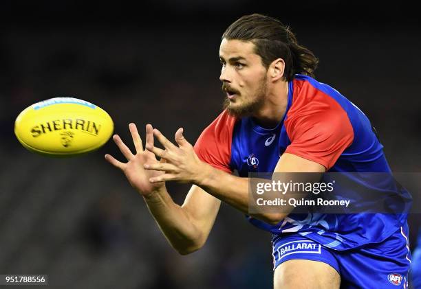 Tom Boyd of the Bulldogs warms up during the AFL round six match between the Western Bulldogs and Carlton Blues at Etihad Stadium on April 27, 2018...