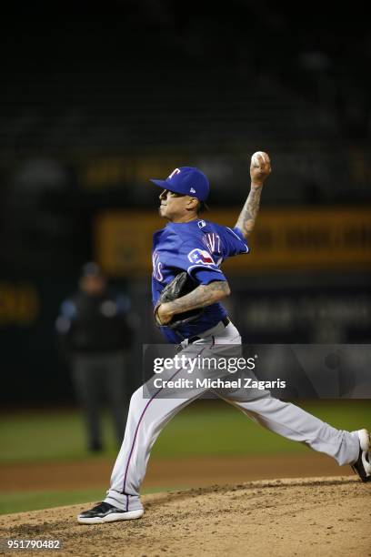 Jesse Chavez of the Texas Rangers pitches during the game against the Oakland Athletics at the Oakland Alameda Coliseum on April 4, 2018 in Oakland,...