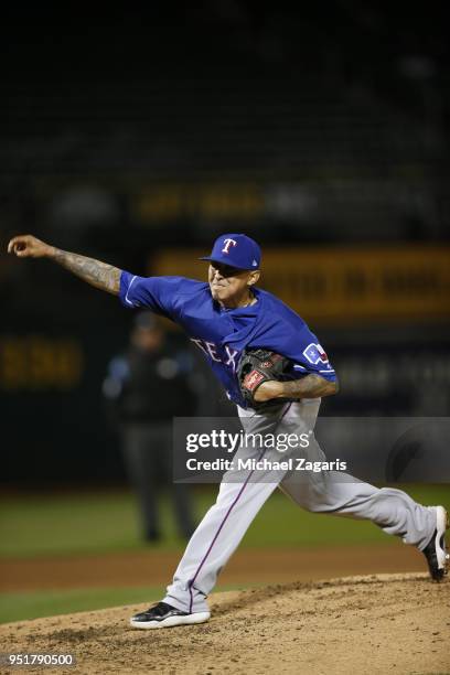 Jesse Chavez of the Texas Rangers pitches during the game against the Oakland Athletics at the Oakland Alameda Coliseum on April 4, 2018 in Oakland,...