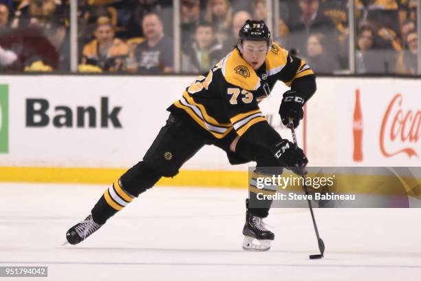 Charlie McAvoy of the Boston Bruins skates with the puck against the Toronto Maple Leafs in Game Seven of the Eastern Conference First Round in the...