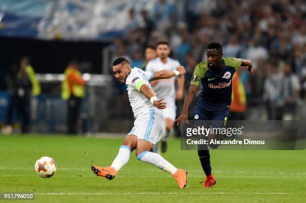 Dimitri Payet of Marseille and Diadie Samassekou of Salzburg during the Europa League semi final first leg match between Marseille and RB Salzburg at...